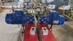 Etiquetadora automtica de doble cabezal para botellas planas Bauch Campos