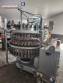 M�quina de llenado rotativa de acero inoxidable para bebidas carbonatadas y refrescos, 42 boquillas, KHS con lavadora Zegla.