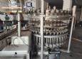 M�quina de llenado rotativa de acero inoxidable para bebidas carbonatadas y refrescos, 42 boquillas, KHS con lavadora Zegla.