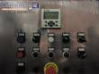 Llenadora rotativa gravimtrica de acero inoxidable con cabina
