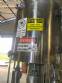 Llenadora rotativa gravimtrica de acero inoxidable con cabina