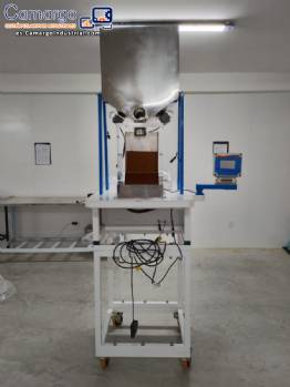 M�quina JHM Maximatic para dosificaci�n, pesaje, llenado y envasado de polvo de 150 a 1000 gramos.
