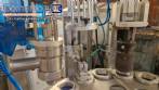 M�quina rotativa de acero inoxidable para llenado, dosificaci�n y sellado, con junta de aluminio, para tarros, vasos y botellas Delgo.