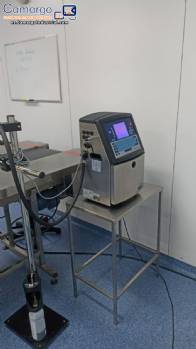 Cinta transportadora con fechador y mesa de apoyo en acero inoxidable de 10 metros