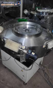 Alimentador rotativo de balas y goma de mascar tipo m�quinas Flow Pack